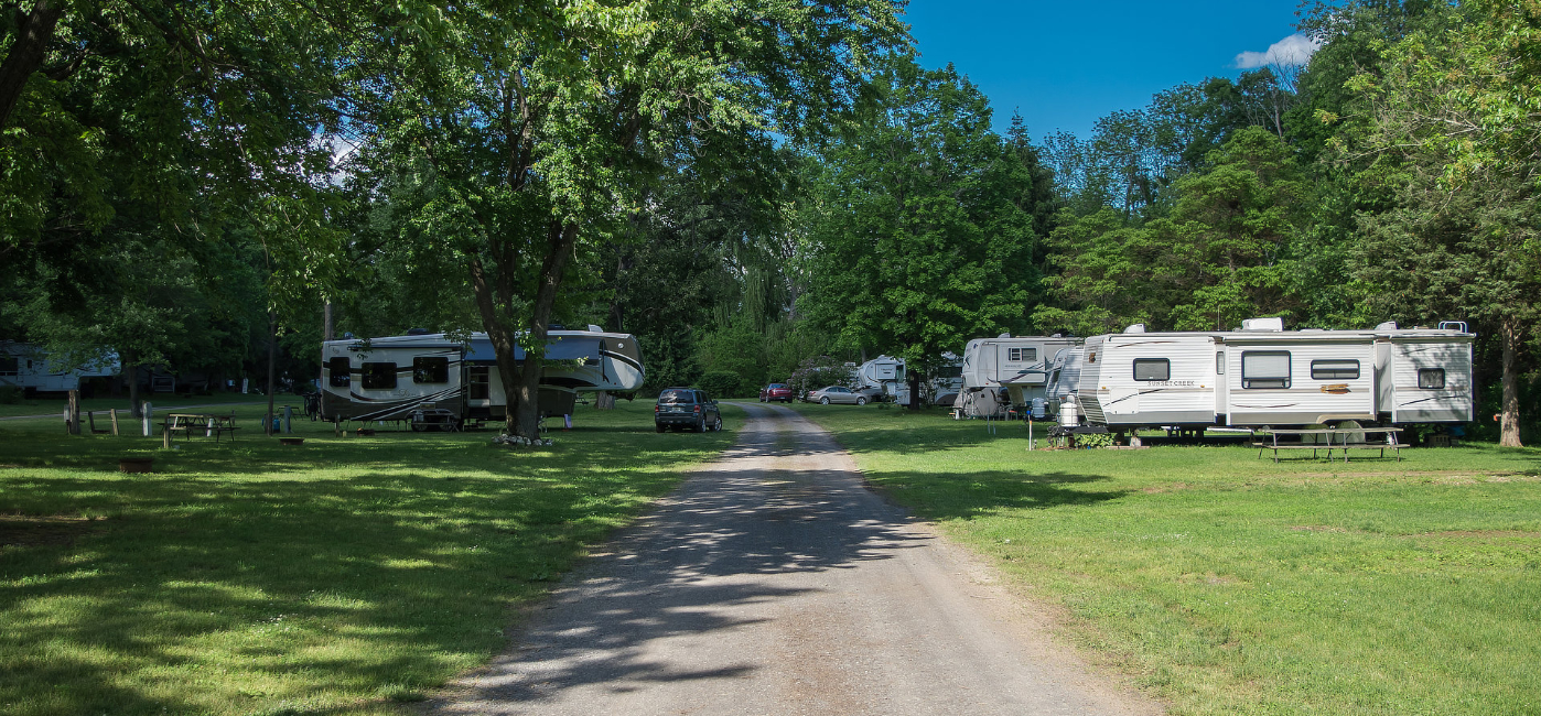 RV sites with trees and grassy area